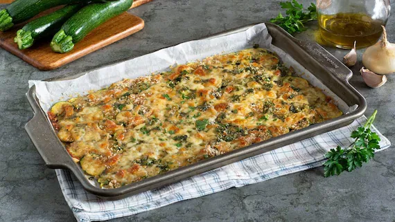 Zucchine al formaggio: il contorno filante e croccante pronto in pochi minuti